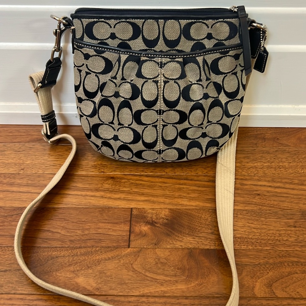 Cross body navy and cream Coach bag